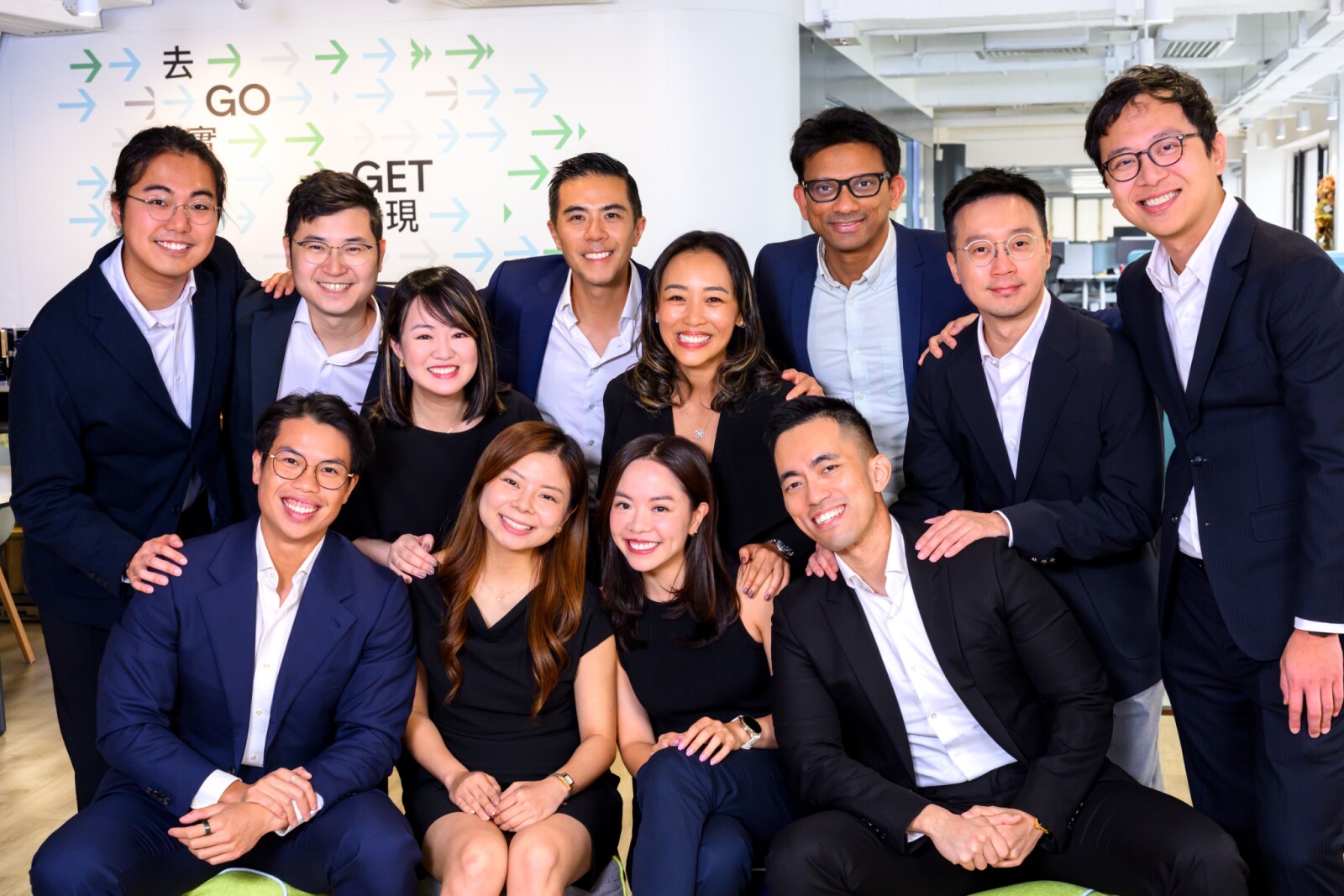 Estyn Chung (back row, fourth from left), General Manager of Uber Taiwan, Hong Kong and Macau, with the Hong Kong management team